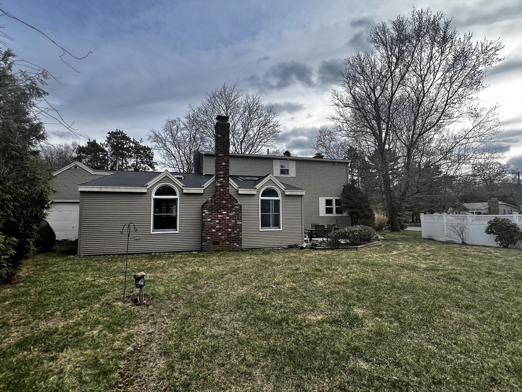 6 Mayfield Road Auburn, MA 01501 - Photo 7 of 30 a house that has a tree in front of it