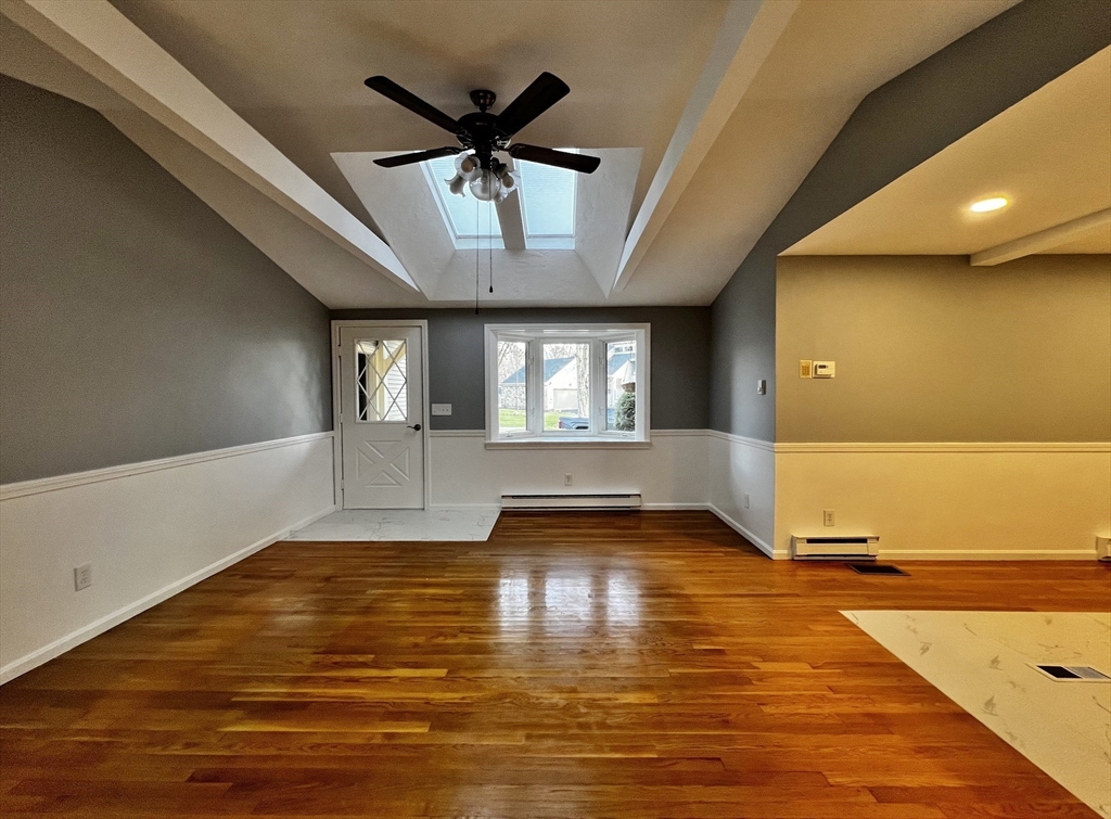 6 Mayfield Road Auburn, MA 01501 - Photo 9 of 30 a view of empty room with wooden floor and fan