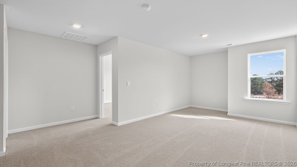 123 Charlies Bnd Way Spring Lake, NC 28390 - Photo 17 of 34 a view of an empty room with a window