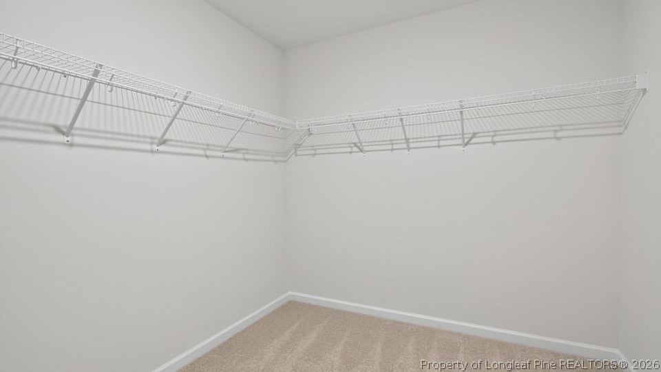 123 Charlies Bnd Way Spring Lake, NC 28390 - Photo 30 of 34 a view of a room with racks on the wall