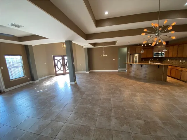 a view of a livingroom with a flat screen tv