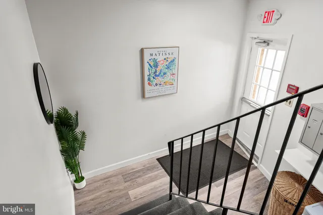 a view of entryway with wooden floor