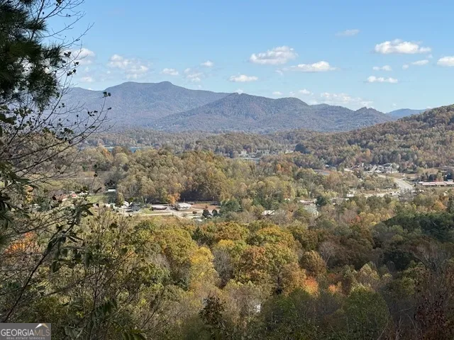 a view of mountains and valleys