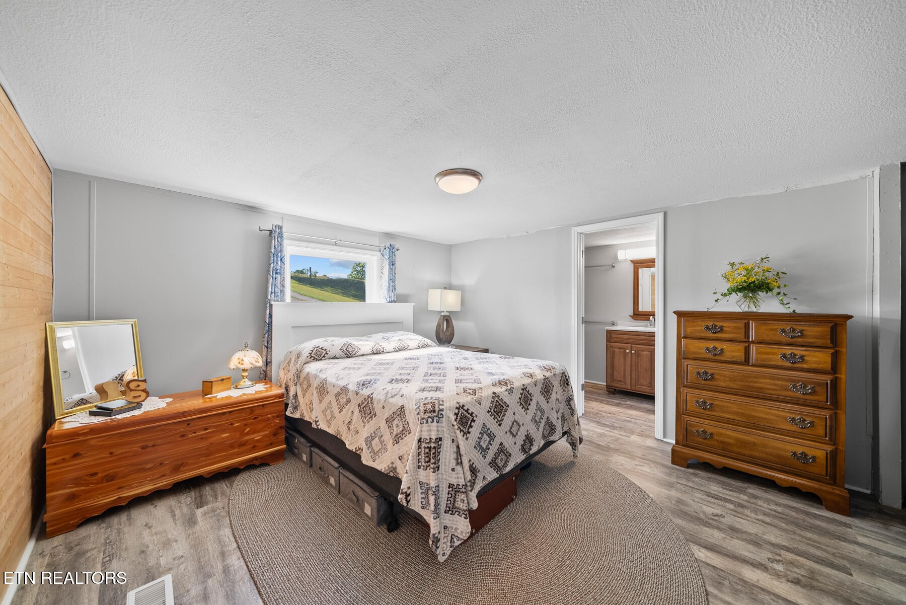 390 Sparkman Town Road Rock Island, TN 38581 - Photo 13 of 33 a bedroom with a bed and a closet