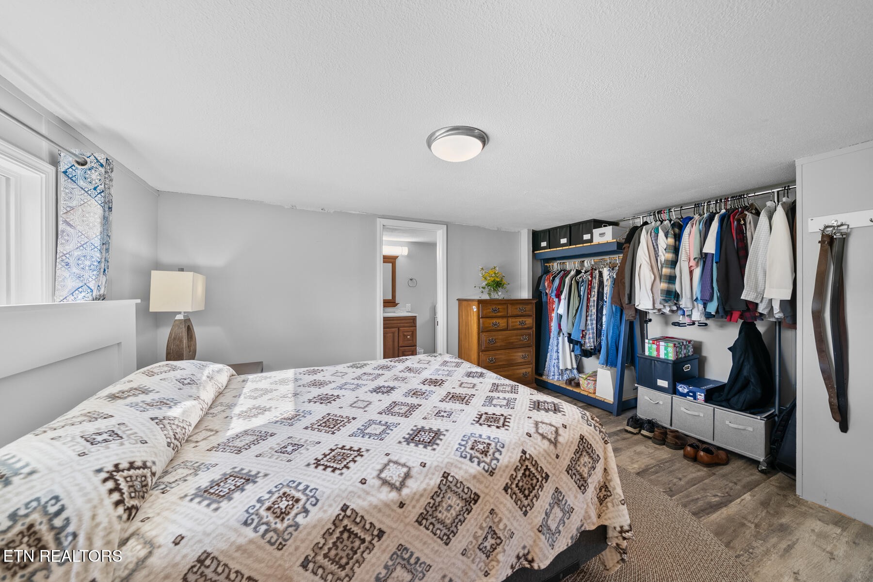 390 Sparkman Town Road Rock Island, TN 38581 - Photo 15 of 33 a bedroom with a bed and a closet