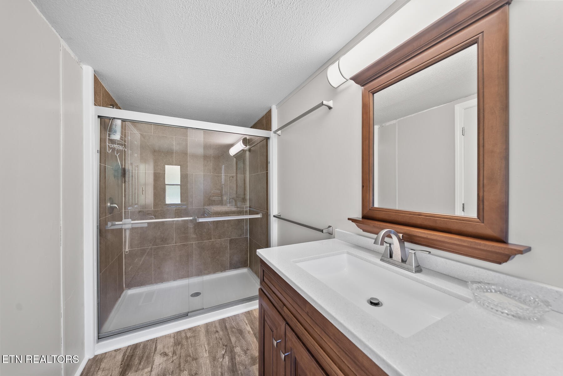 390 Sparkman Town Road Rock Island, TN 38581 - Photo 17 of 33 a bathroom with a sink and a mirror
