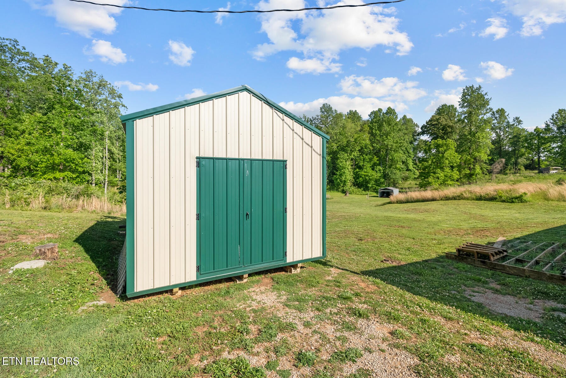 390 Sparkman Town Road Rock Island, TN 38581 - Photo 22 of 33 a view of a house with a big yard