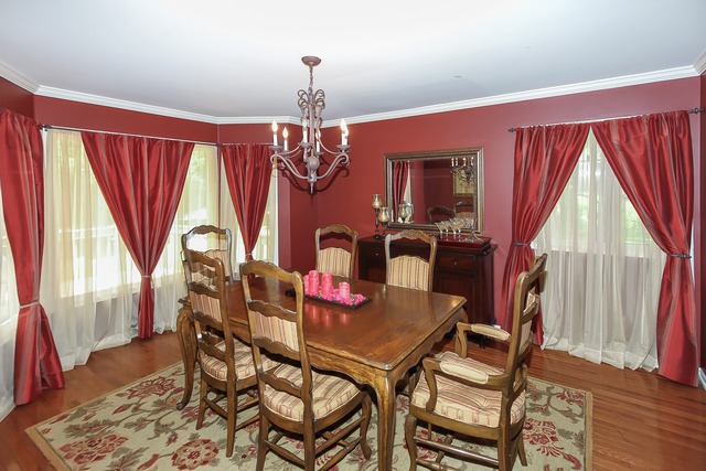 650 Raintree Court Buffalo Grove, IL 60089 - Photo 6 of 25 a view of a dining room with furniture and window
