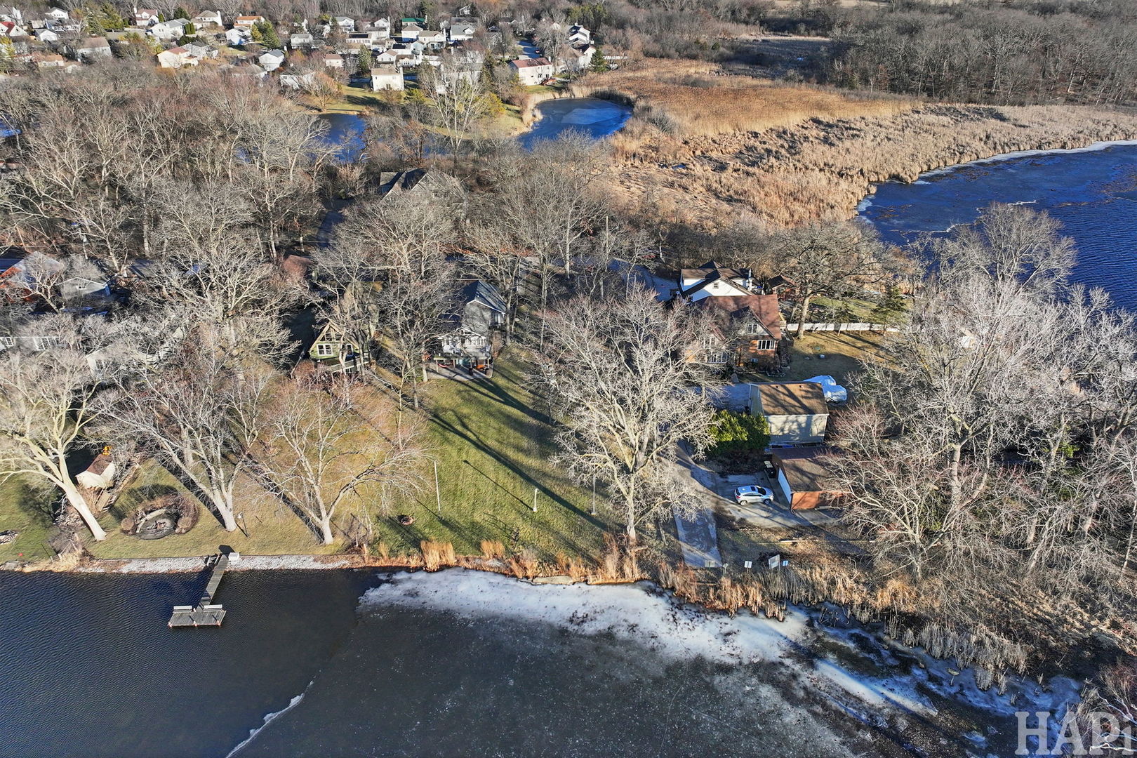 42028 North East Road Antioch, IL 60002 - Photo 2 of 15 a view of a tree in a yard