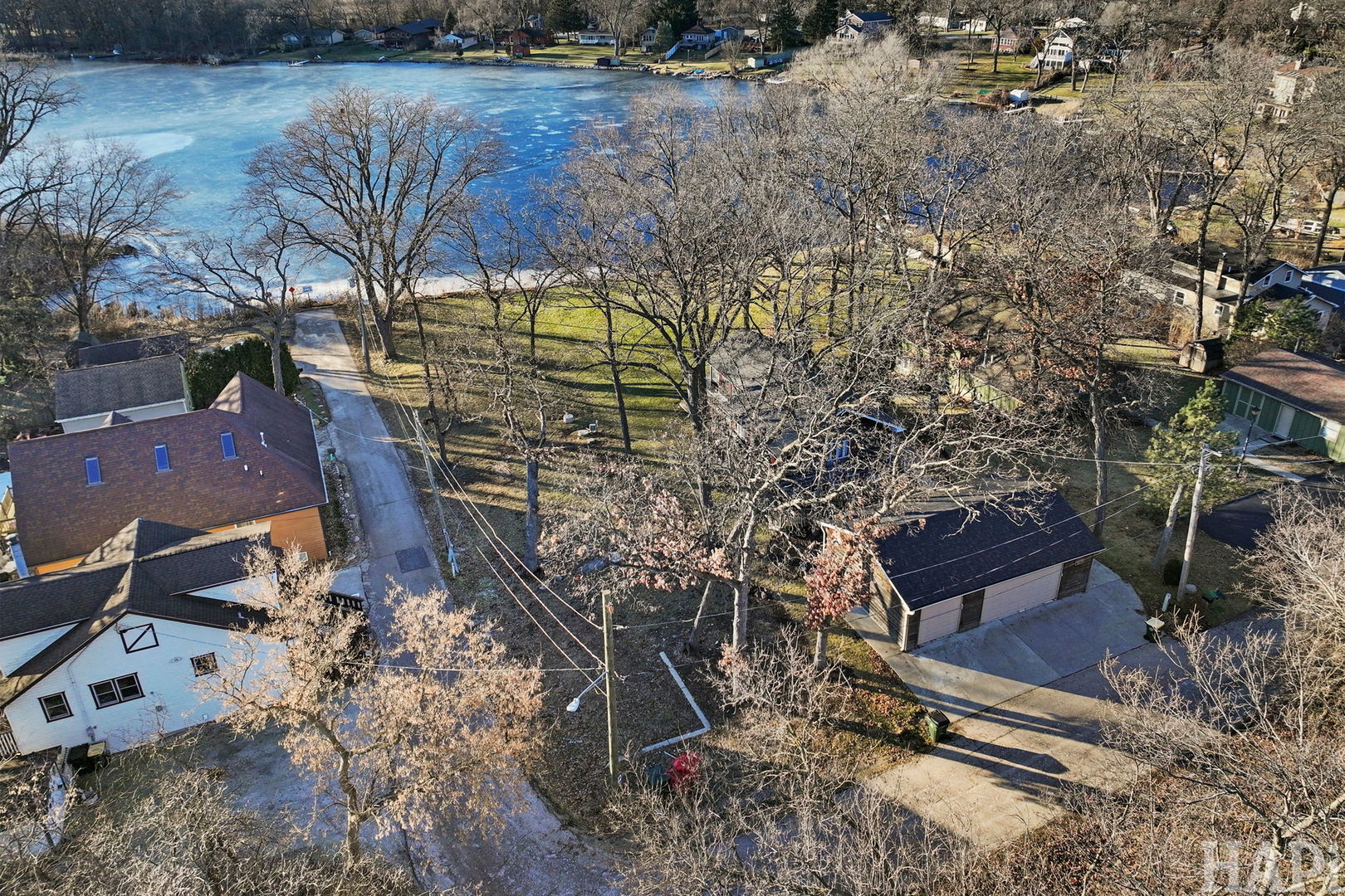 42028 North East Road Antioch, IL 60002 - Photo 6 of 15 a view of a yard with a bench