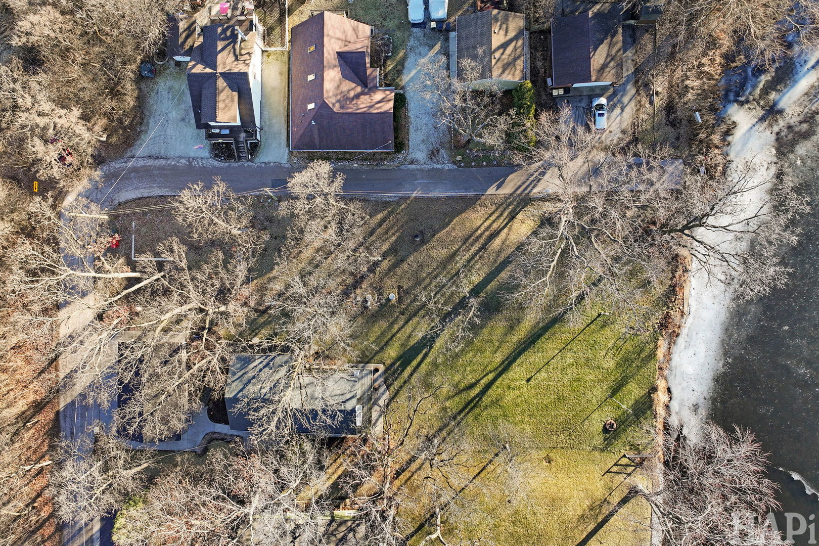 42028 North East Road Antioch, IL 60002 - Photo 8 of 15 a view of a yard with plants and trees