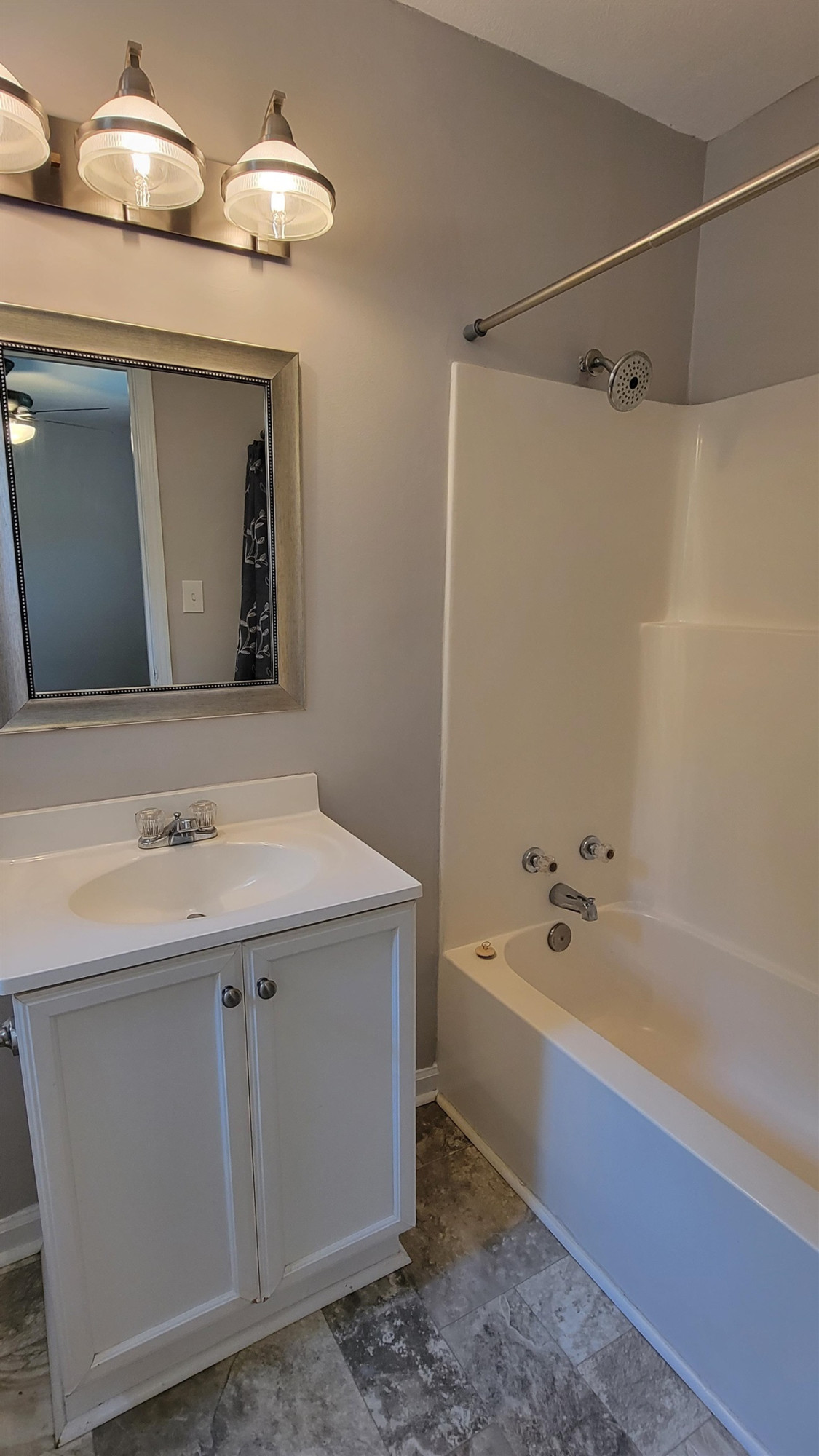 183 Spring Creek Law Road Jackson, TN 38305 - Photo 27 of 42 a bathroom with a sink a toilet and bathtub