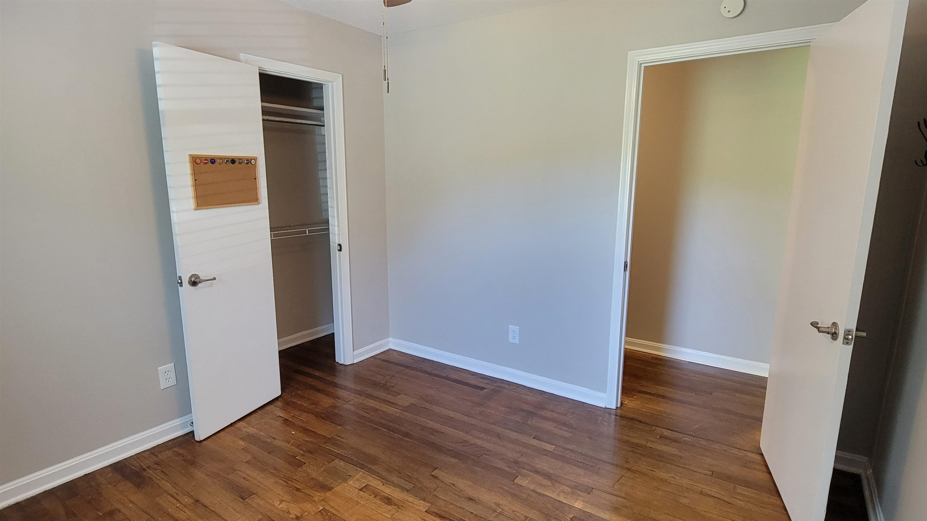 183 Spring Creek Law Road Jackson, TN 38305 - Photo 38 of 42 an empty room with wooden floor and closet