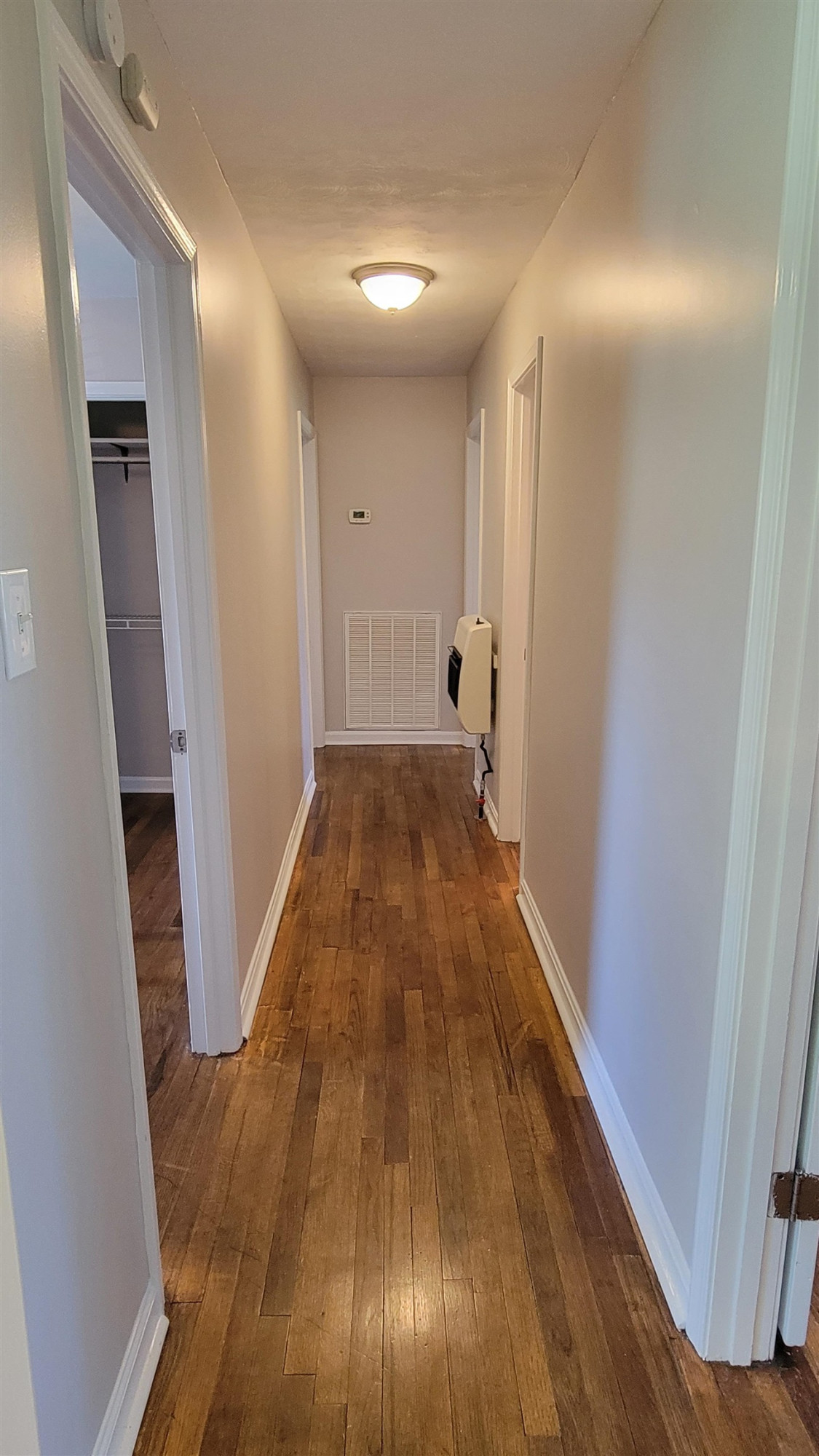 183 Spring Creek Law Road Jackson, TN 38305 - Photo 40 of 42 a view of a hallway with wooden floor