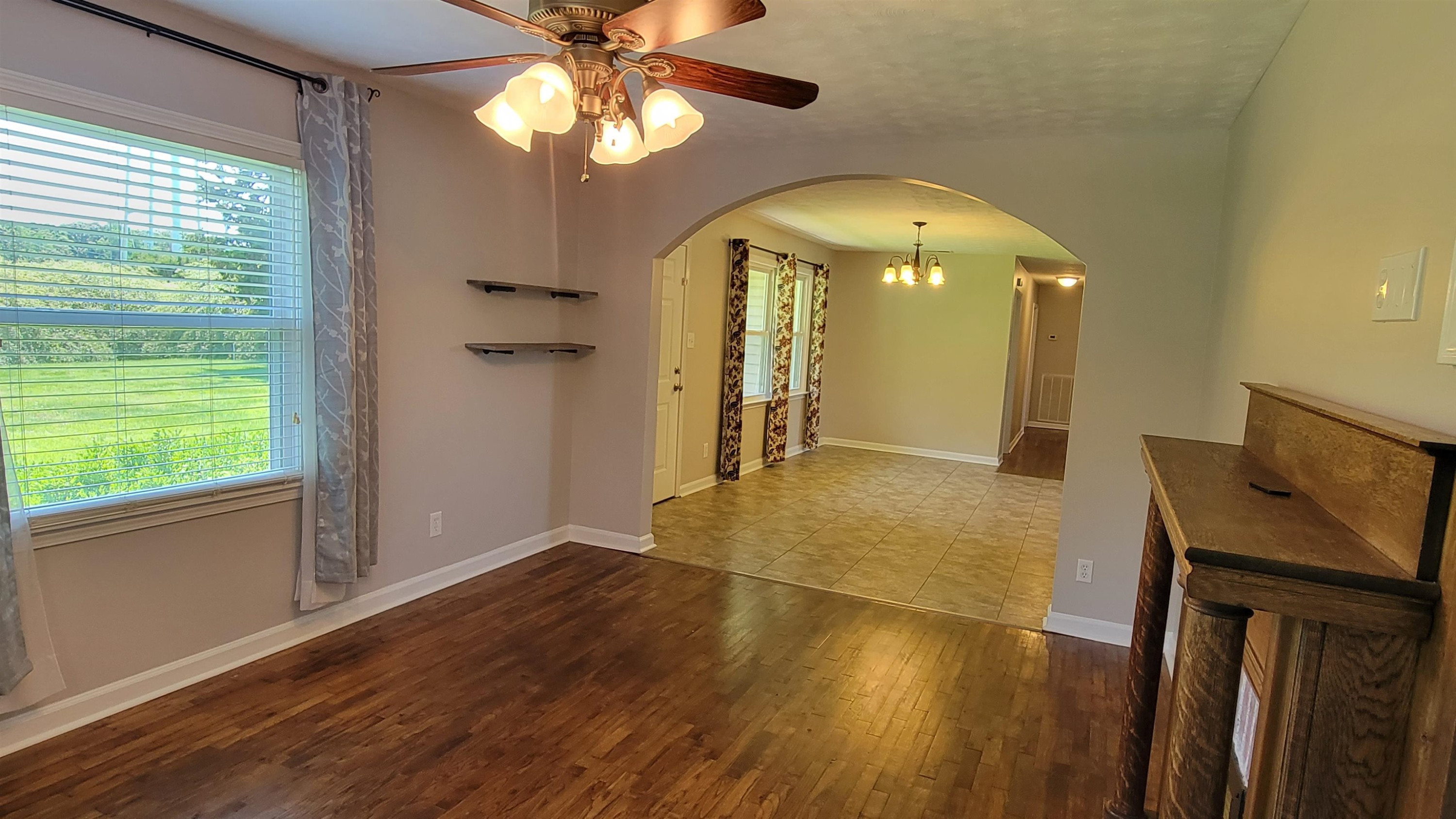 183 Spring Creek Law Road Jackson, TN 38305 - Photo 7 of 42 a view of a livingroom with a flat screen tv