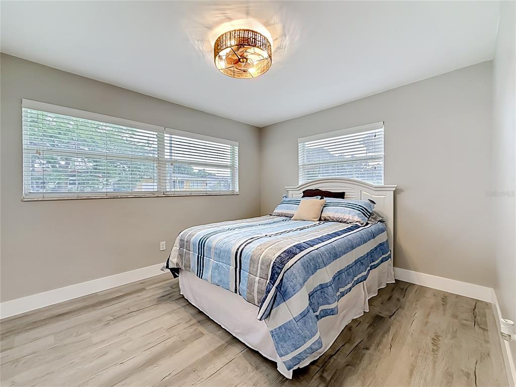 508 Shore Drive Largo, FL 33771 - Photo 18 of 31 a bedroom with a bed and a window
