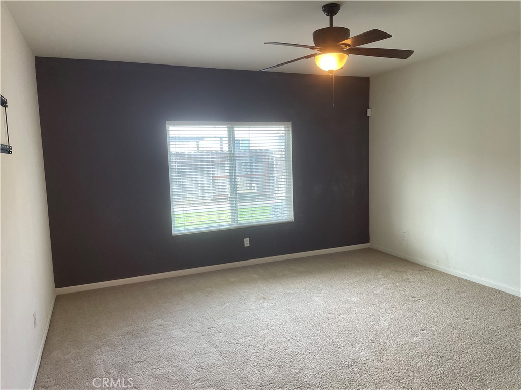 3583 Sarasota Avenue Merced, CA 95348 - Photo 20 of 23 a view of an empty room with a window