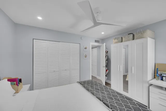 a view of livingroom with walk in closet and bedroom