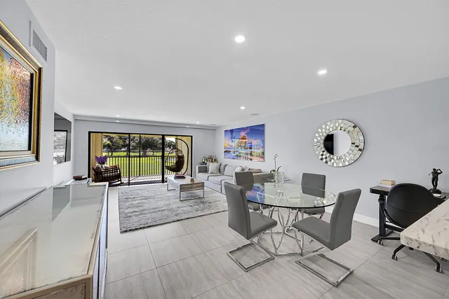 a view of a livingroom with furniture window and outside view