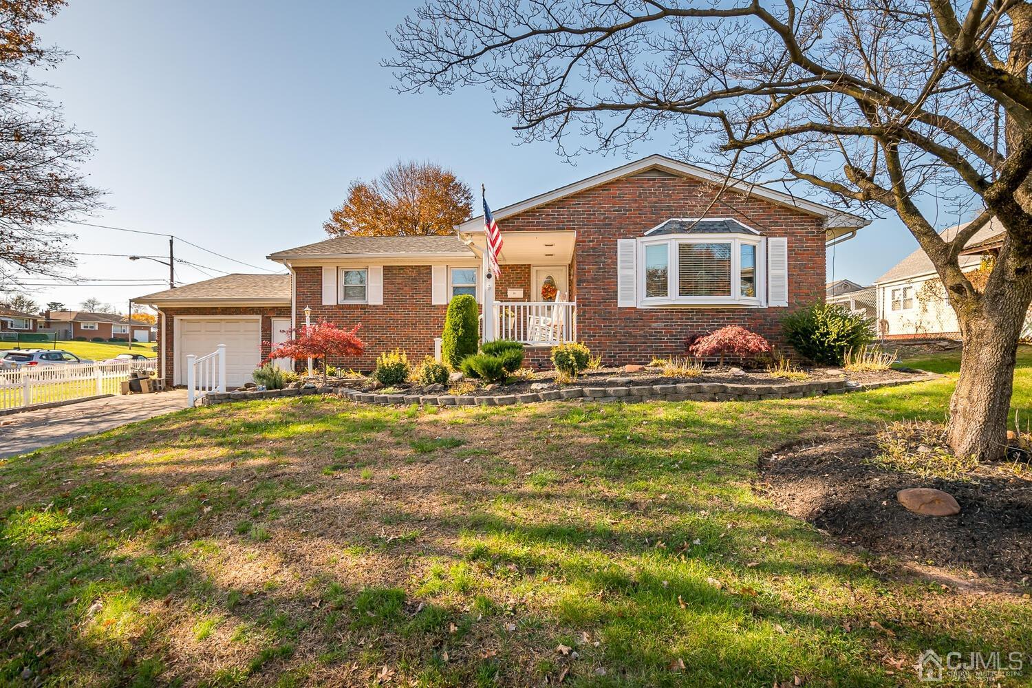 50 Old Post Road Edison, NJ 08817 - Photo 1 of 39 a front view of a house with a big yard