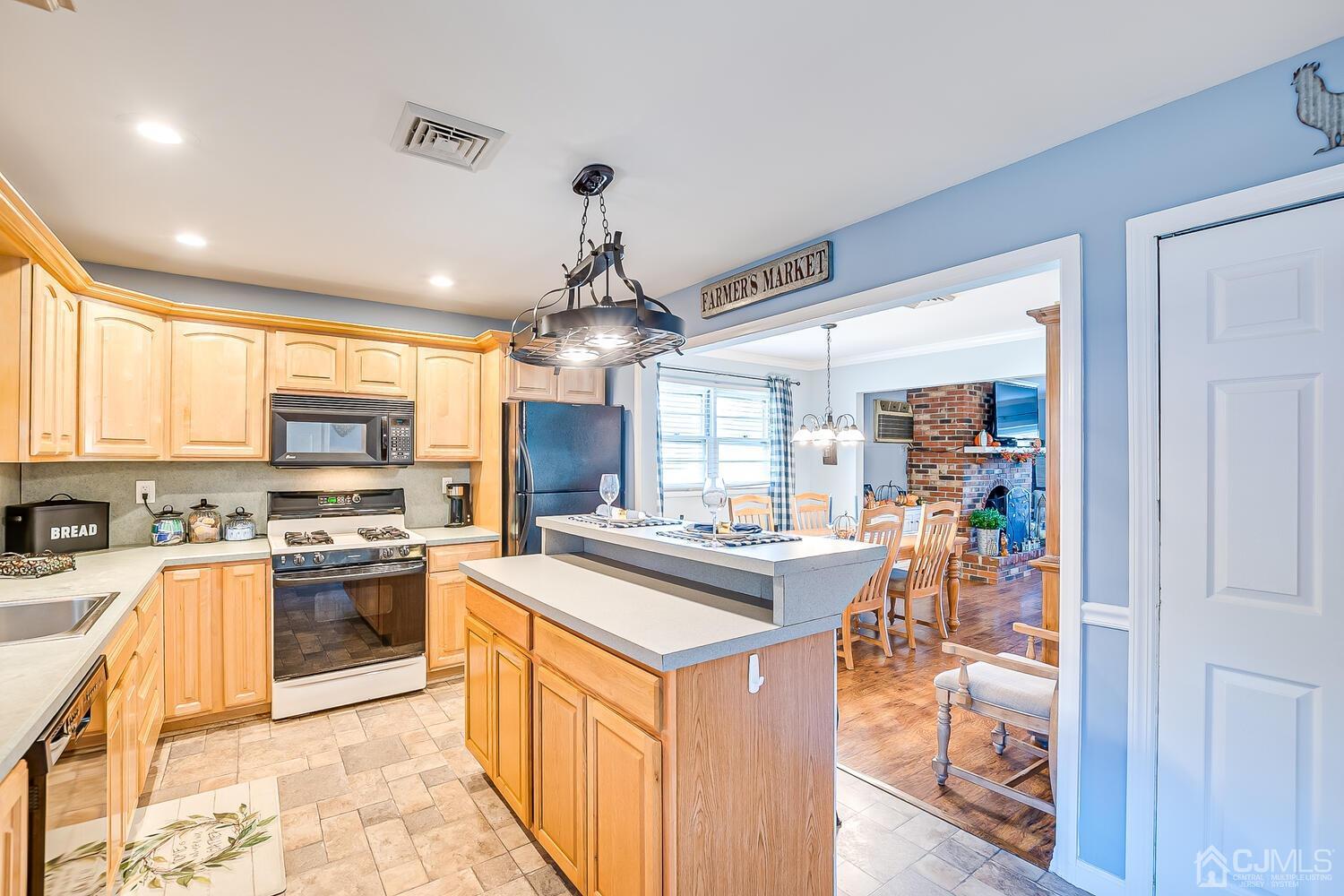 50 Old Post Road Edison, NJ 08817 - Photo 17 of 39 a kitchen with stainless steel appliances granite countertop a sink stove and refrigerator