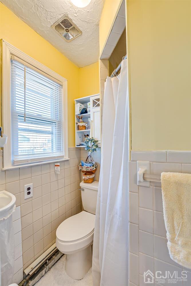 50 Old Post Road Edison, NJ 08817 - Photo 22 of 39 a bathroom with a toilet and a shower