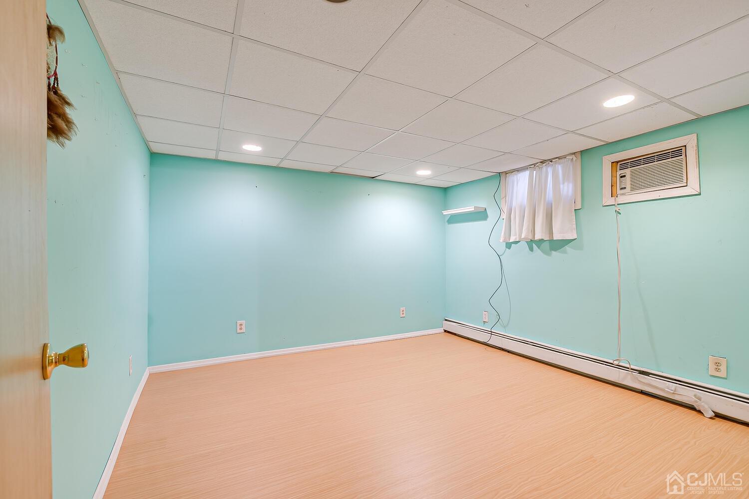 50 Old Post Road Edison, NJ 08817 - Photo 30 of 39 a view of a room with a projector