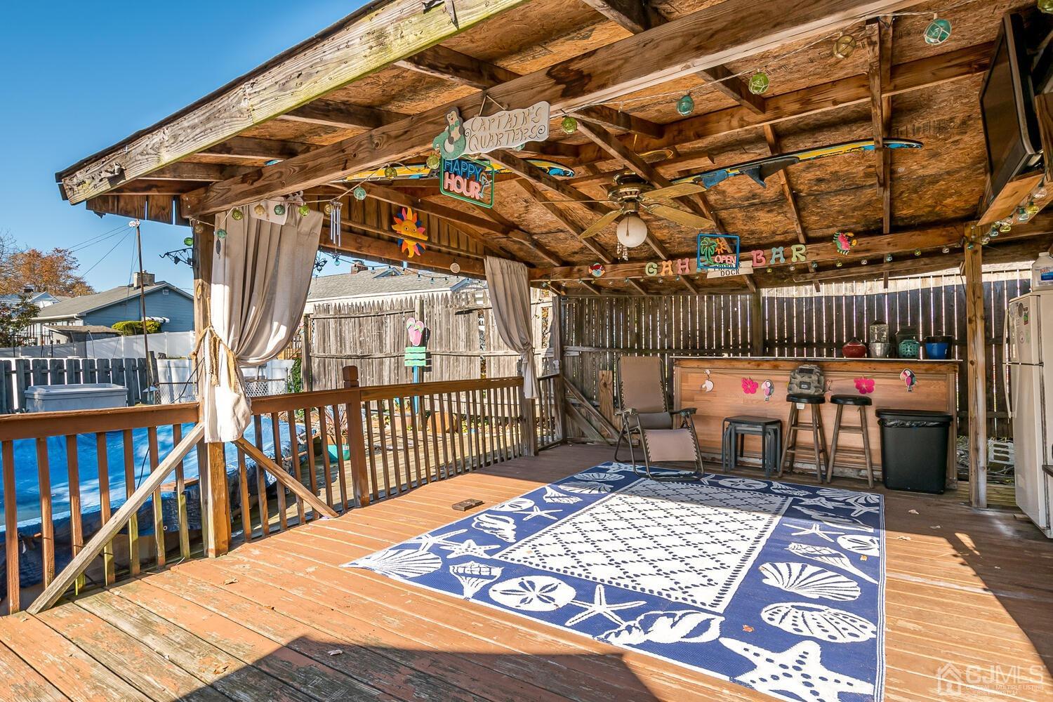 50 Old Post Road Edison, NJ 08817 - Photo 33 of 39 a view of a patio with a table and chairs