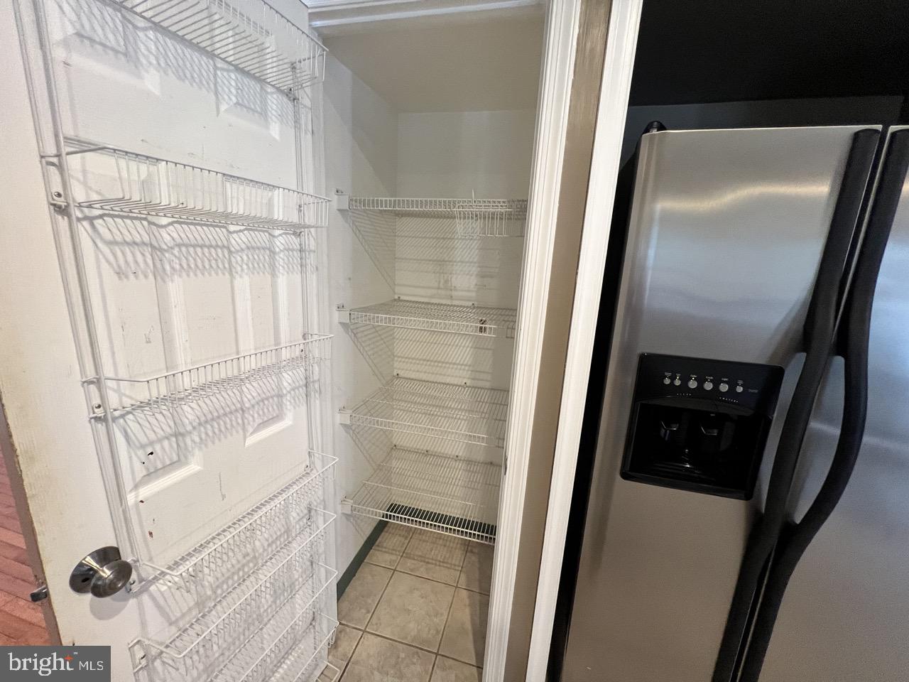 3502 Old Jones Road Dunkirk, MD 20754 - Photo 12 of 61 a bathroom with a glass shower door and a sink