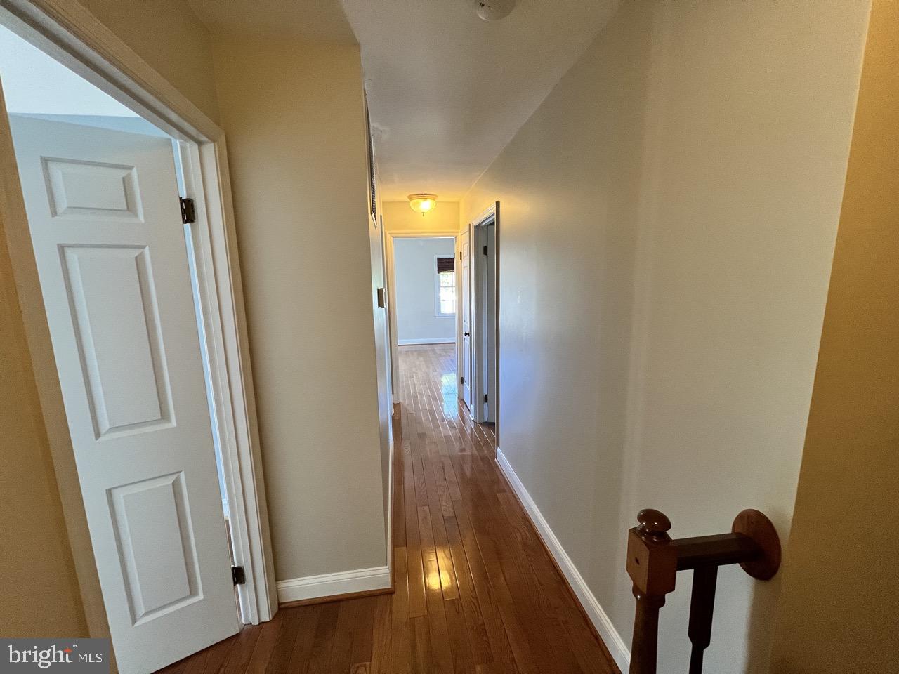 3502 Old Jones Road Dunkirk, MD 20754 - Photo 19 of 61 a view of a hallway with wooden floor and staircase