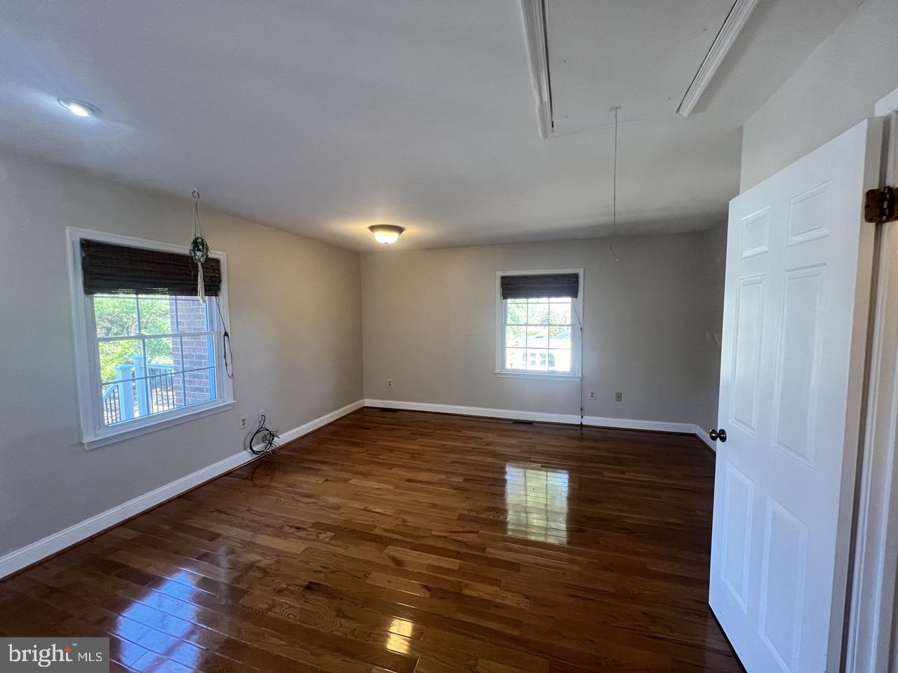 3502 Old Jones Road Dunkirk, MD 20754 - Photo 20 of 61 a view of an empty room with wooden floor and a window