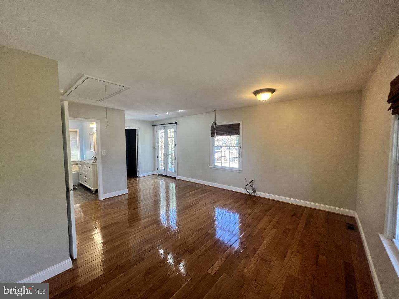 3502 Old Jones Road Dunkirk, MD 20754 - Photo 21 of 61 a view of an empty room with window and wooden floor