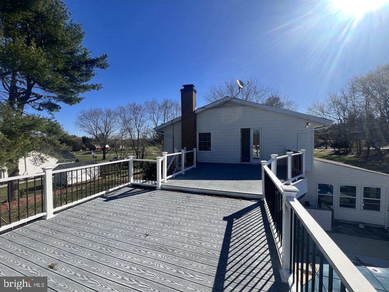 3502 Old Jones Road Dunkirk, MD 20754 - Photo 29 of 61 a view of a roof deck with wooden floor and fence
