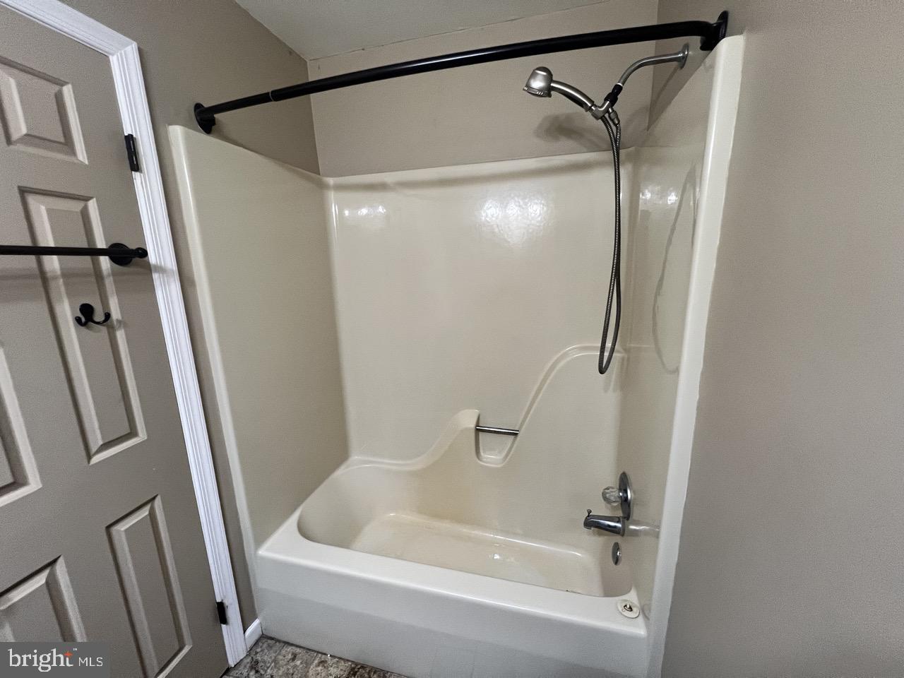 3502 Old Jones Road Dunkirk, MD 20754 - Photo 31 of 61 a bathroom with a bathtub and a shower