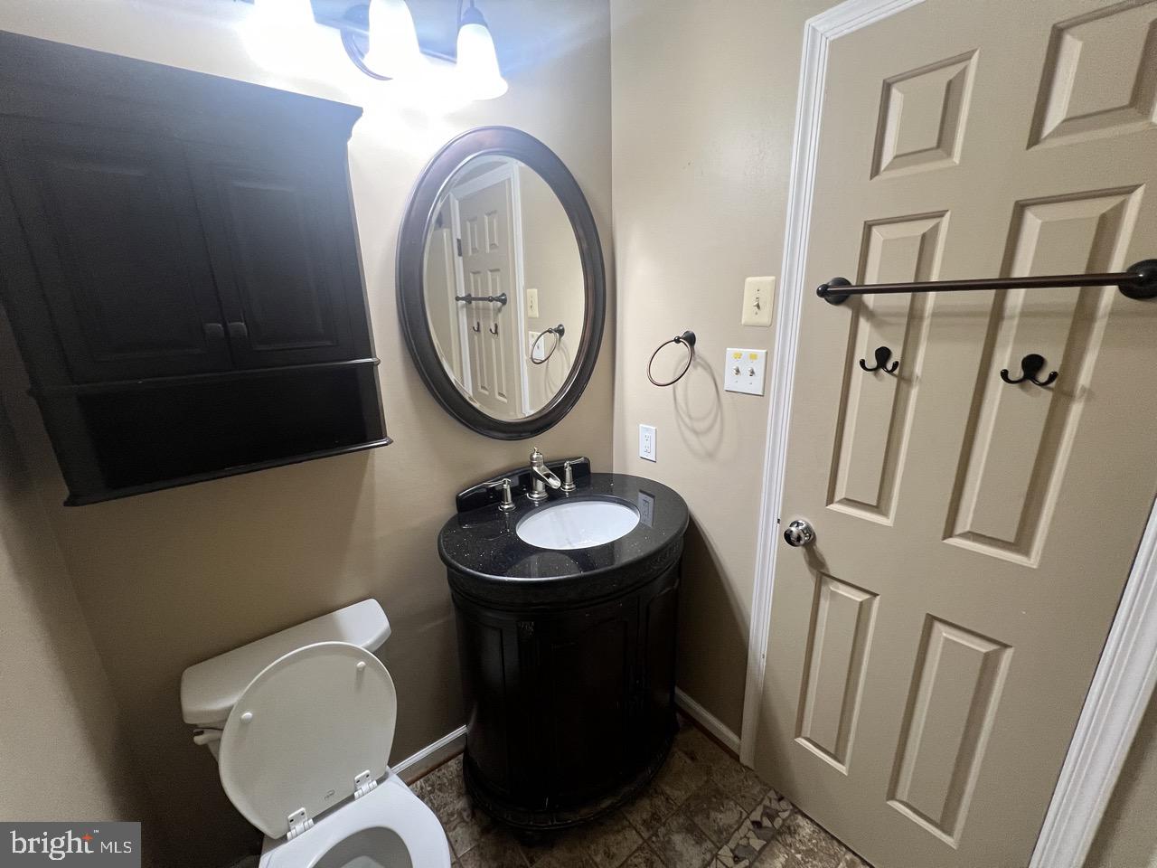 3502 Old Jones Road Dunkirk, MD 20754 - Photo 32 of 61 a bathroom with a toilet and a sink