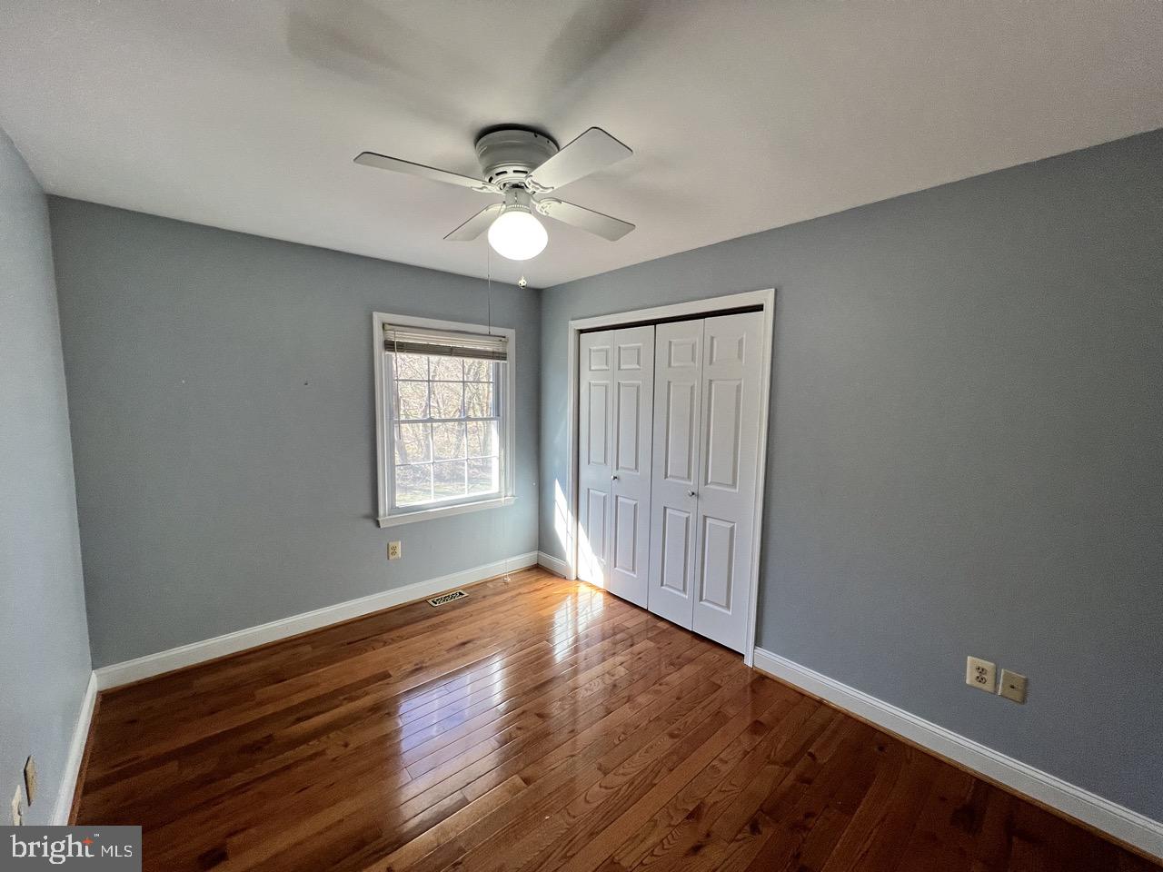 3502 Old Jones Road Dunkirk, MD 20754 - Photo 38 of 61 a view of an empty room with wooden floor and a window