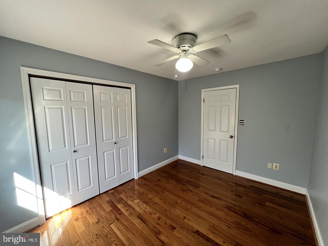 3502 Old Jones Road Dunkirk, MD 20754 - Photo 39 of 61 a view of an empty room with wooden floor and a window
