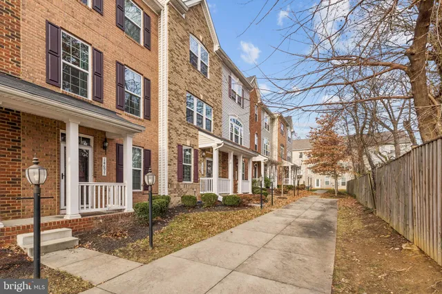 a view of a brick building with many windows