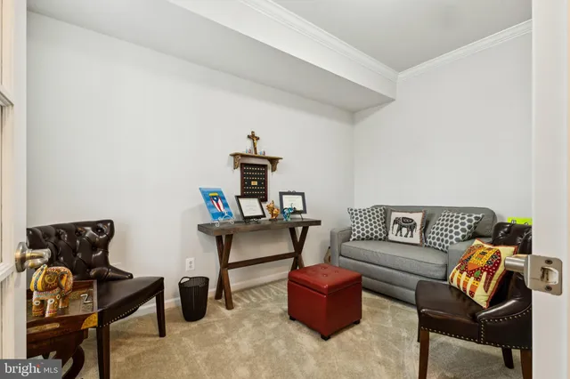 a living room with furniture and a couch