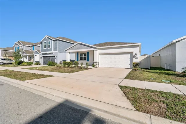 a front view of a house with a outdoor space