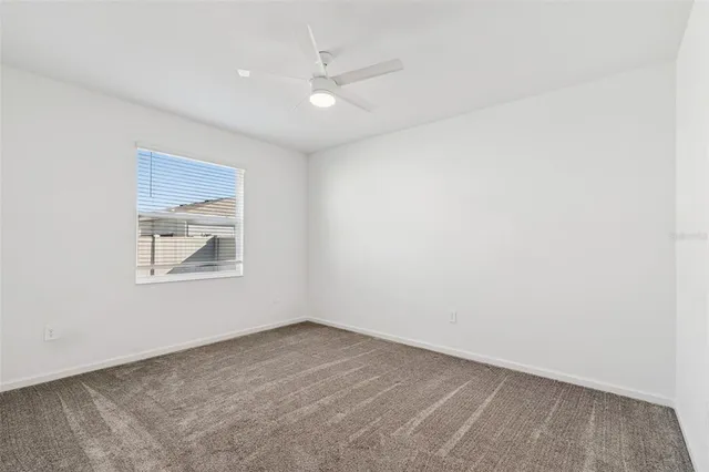 a kitchen with stainless steel appliances a refrigerator sink and microwave