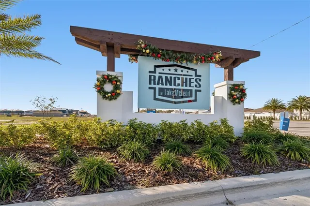 a view of a city with lawn chairs