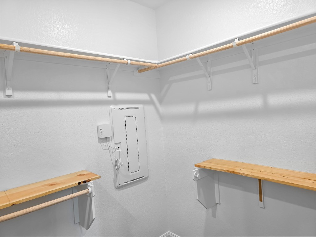 410 Inks Lane Kyle, TX 78640 - Photo 12 of 20 Spacious Master closet featuring electric panel