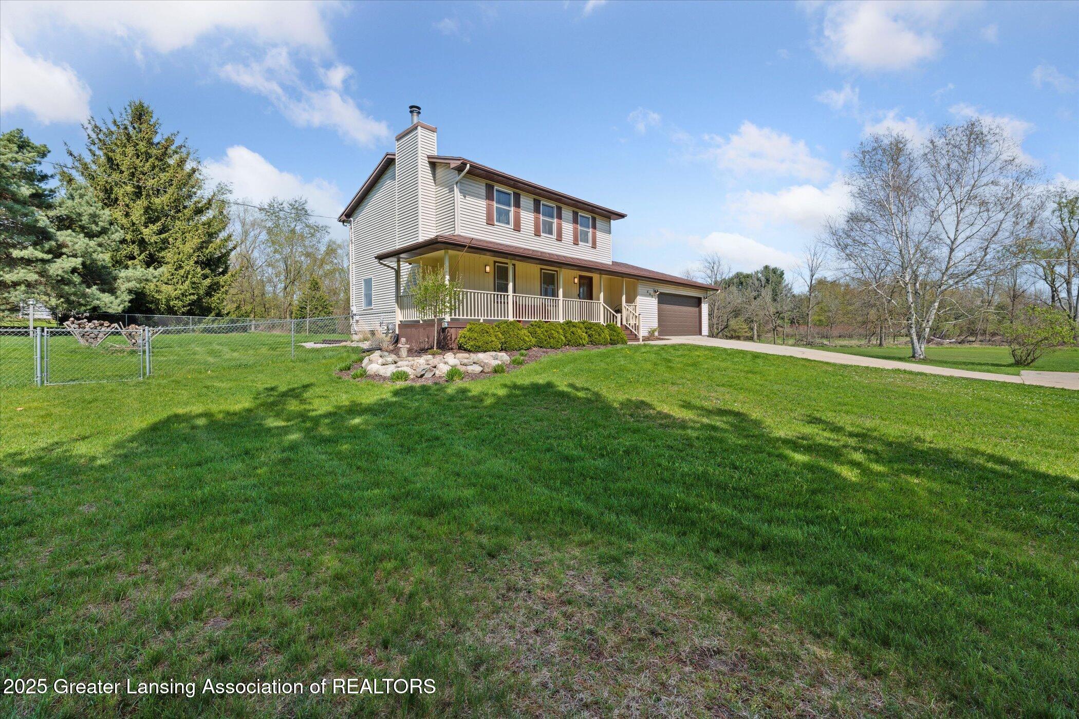 465 Creyts Road Dimondale, MI 48821 - Photo 2 of 43 02-465-Creyts-Rd-Dimondale-MI-48821-Wind
