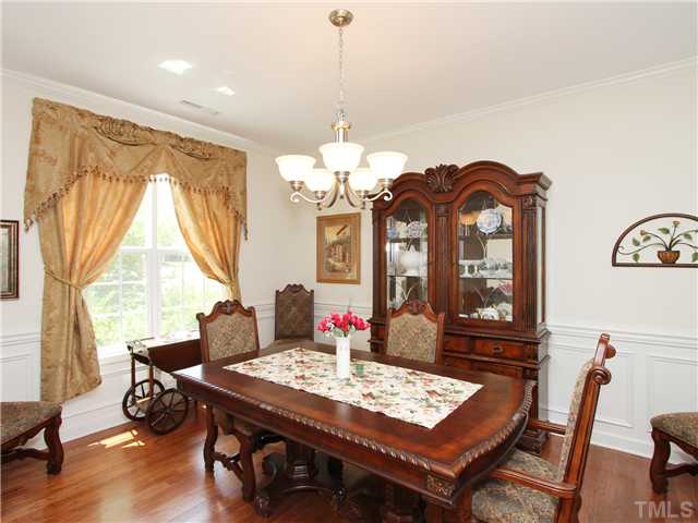 5228 Holly Ridge Farm Road Raleigh, NC 27616 - Photo 3 of 25 FORMAL DINING WITH CROWN & PICTURE MOLDING