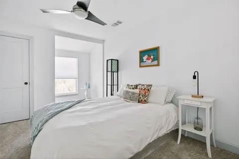 a room with a sink and a mirror