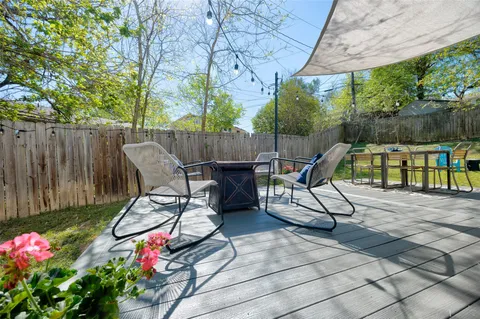 a bedroom with a bed and a table