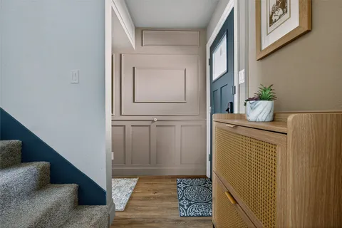 a view of a table and chairs on the roof deck