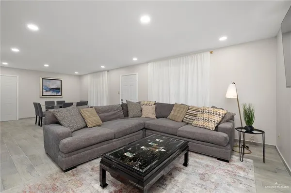 a living room with furniture and a couch