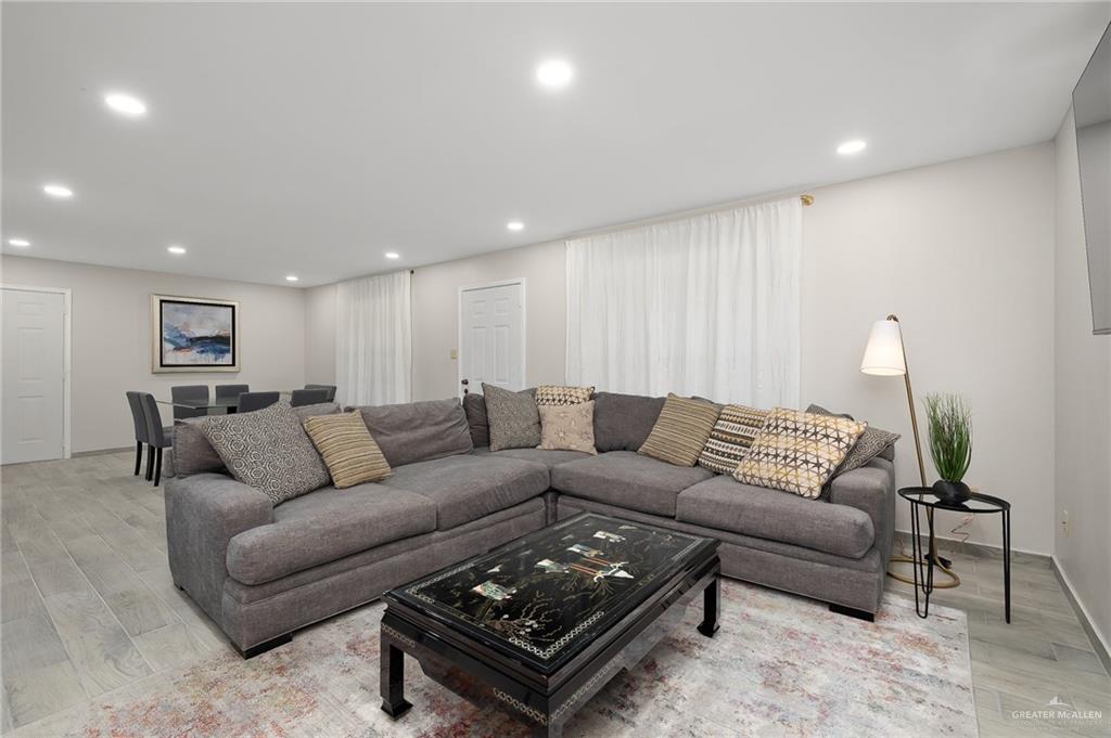 500 East El Rancho Avenue, Unit 36 McAllen, TX 78503 - Photo 5 of 16 a living room with furniture and a couch